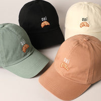 Oui Croissant Baseball Cap