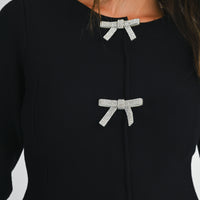 Jewel Bow Peplum Knit Top